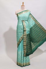 Green geometric zari motifs design art mysore silk saree with contrast zari border and blouse
