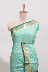 Green geometric zari motifs design art mysore silk saree with contrast zari border and blouse