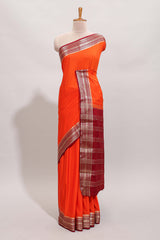 Orange plain design art mysore silk saree with contrast zari border and blouse