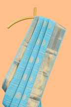 Turquoise blue striped zari motifs art silk saree with self zari border and matching blouse