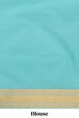 Turquoise green striped zari motifs art silk saree with self zari border and matching blouse