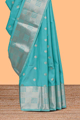 Turquoise blue zari motifs art silk saree with self zari border and matching blouse