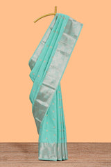 Turquoise green zari motifs art silk saree with self zari border and matching blouse
