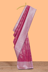 Pink striped floral design art silk saree with contrast zari border and zari motifs blouse