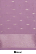 Pink striped floral design art silk saree with contrast zari border and zari motifs blouse