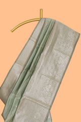 Pista green zari floral motifs art silk saree with self zari border and matching motifs blouse