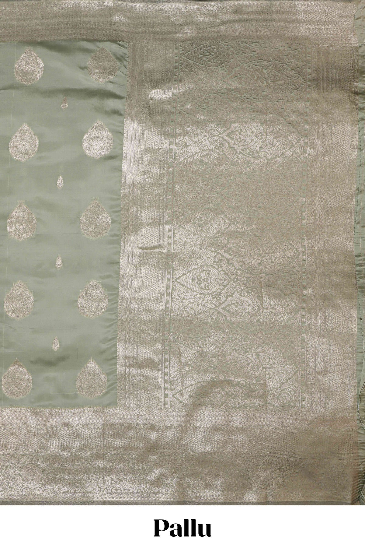 Pista green zari floral motifs art silk saree with self zari border and matching motifs blouse