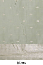 Pista green zari floral motifs art silk saree with self zari border and matching motifs blouse