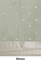 Pista green zari floral motifs art silk saree with self zari border and matching motifs blouse