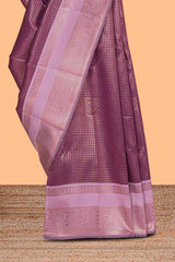 Purple checked zari motifs art silk saree with contrast zari border and contrast motifs blouse