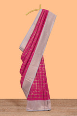 Pink checked zari motifs art silk saree with contrast zari border and contrast motifs blouse