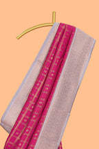 Pink checked zari motifs art silk saree with contrast zari border and contrast motifs blouse