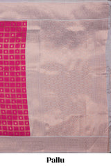 Pink checked zari motifs art silk saree with contrast zari border and contrast motifs blouse