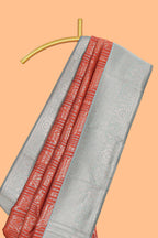 Orange striped floral design art silk saree with contrast zari border and zari motifs blouse