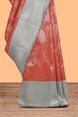 Orange striped floral design art silk saree with contrast zari border and zari motifs blouse