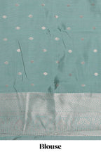 Orange striped floral design art silk saree with contrast zari border and zari motifs blouse