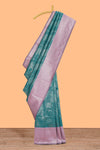 Teal green striped floral design art silk saree with contrast zari border and zari motifs blouse