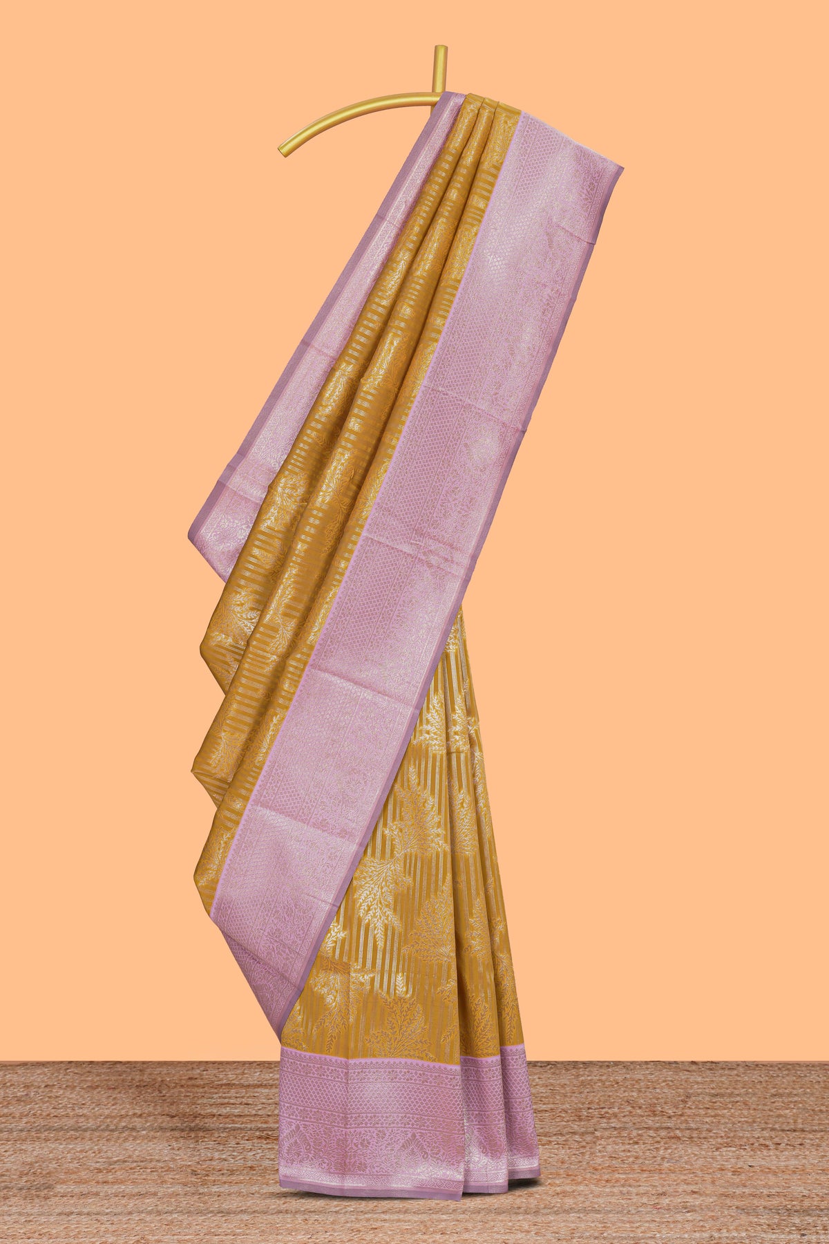 Mustard striped floral design art silk saree with contrast zari border and zari motifs blouse