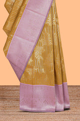 Mustard striped floral design art silk saree with contrast zari border and zari motifs blouse