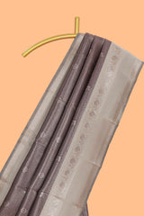 Dark brown checked floral motifs design art silk saree with contrast zari border and motifs blouse