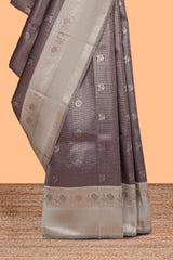Dark brown checked floral motifs design art silk saree with contrast zari border and motifs blouse