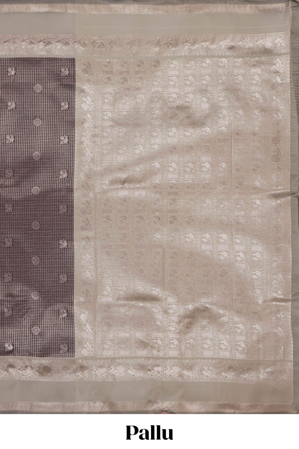 Dark brown checked floral motifs design art silk saree with contrast zari border and motifs blouse