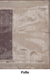 Dark brown checked floral motifs design art silk saree with contrast zari border and motifs blouse