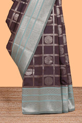 Dark brown checked floral & peacock motifs design art silk saree with contrast zari border and motifs blouse