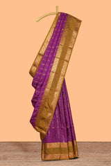Purple striped zari design art silk saree with contrast zari border and matching blouse