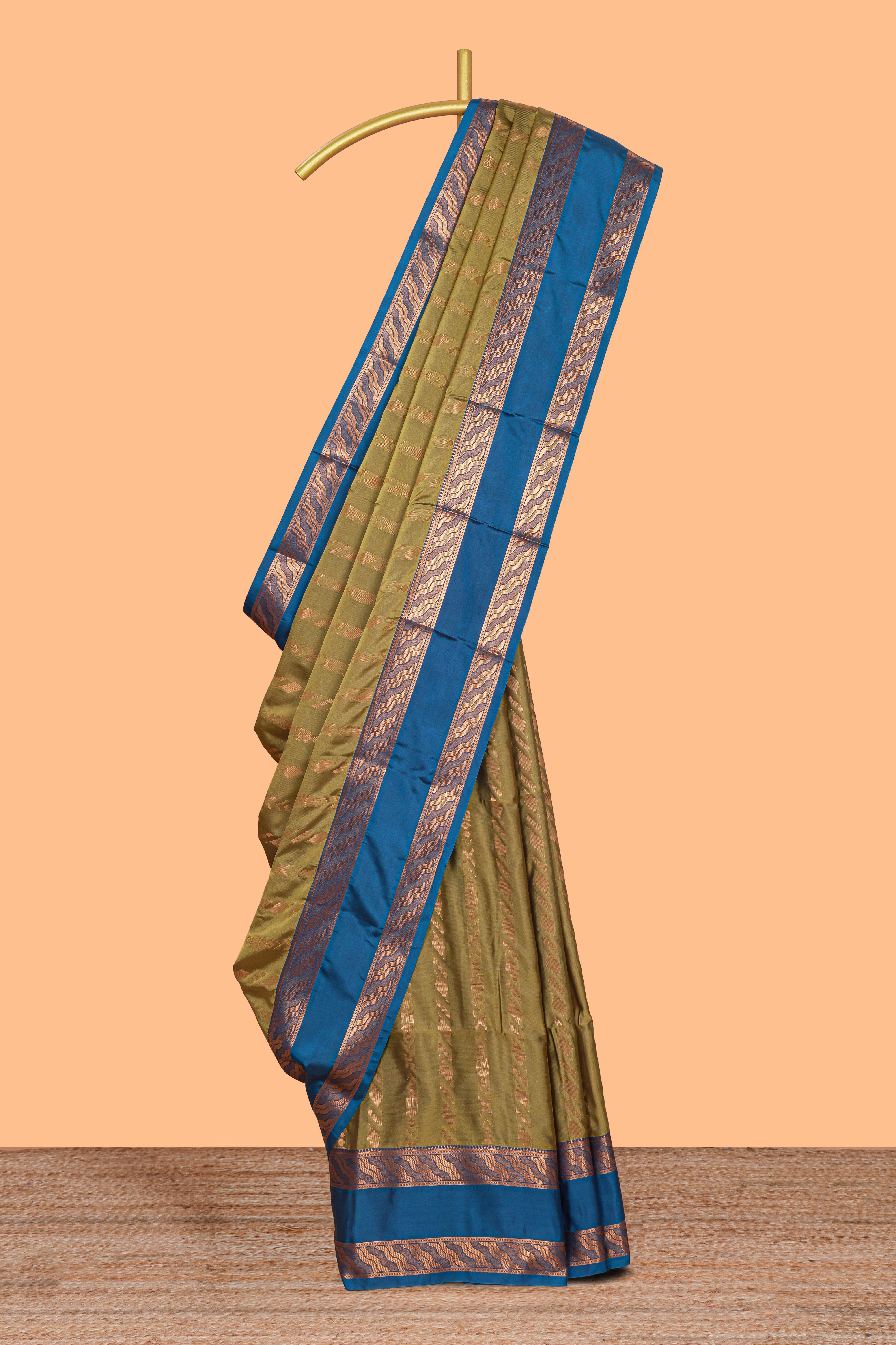 Green striped zari design art silk saree with contrast zari border and blouse