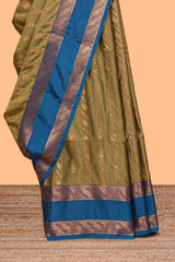 Green striped zari design art silk saree with contrast zari border and blouse