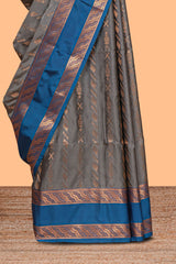 Grey striped zari design art silk saree with contrast zari border and blouse