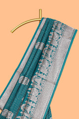 Green floral motifs design art silk saree with self traditional palak design border and contrast blouse