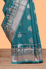 Green floral motifs design art silk saree with self traditional palak design border and contrast blouse