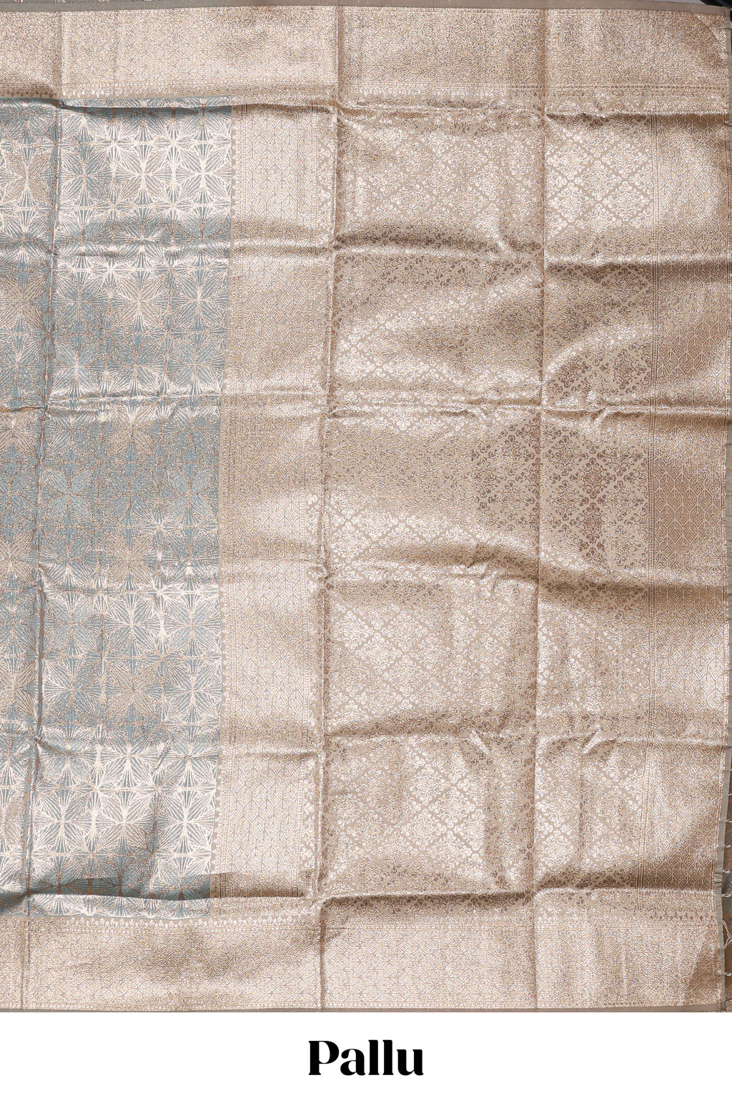 Powder blue  geometric floral design art silk saree with contrast zari border and motifs blouse