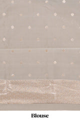 Powder bluegeometric floral design art silk saree with contrast zari border and motifs blouse