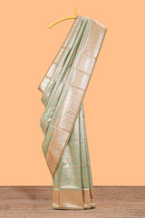 Green floral design art silk saree with contrast zari border and motifs blouse