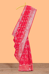Rani pink floral design art silk saree with self zari border and motifs blouse