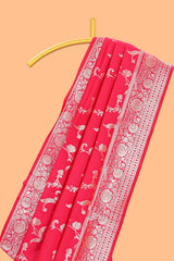 Rani pink floral design art silk saree with self zari border and motifs blouse