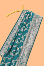 Green floral design art silk saree with self zari border and matching motifs blouse
