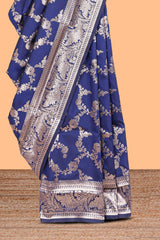 Blue floral design art silk saree with self zari border and matching motifs blouse