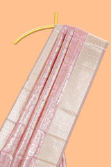 Pink geometric floral design art silk saree with contrast zari border and motifs blouse