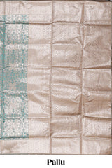Green geometric floral design art silk saree with contrast zari border and motifs blouse