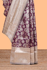 Purple floral design art silk saree with contrast zari border and motifs blouse