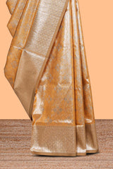 Mustard floral design art silk saree with contrast zari border and motifs blouse