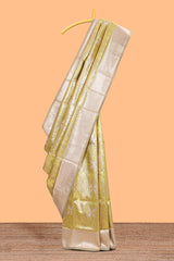 Lemon yellow geometric floral design art silk saree with contrast zari border and motifs blouse