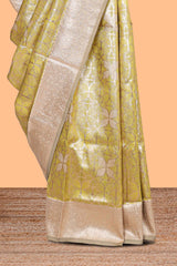 Lemon yellow geometric floral design art silk saree with contrast zari border and motifs blouse