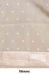 Lemon yellow geometric floral design art silk saree with contrast zari border and motifs blouse