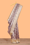Purple floral design art silk saree with contrast zari border and motifs blouse