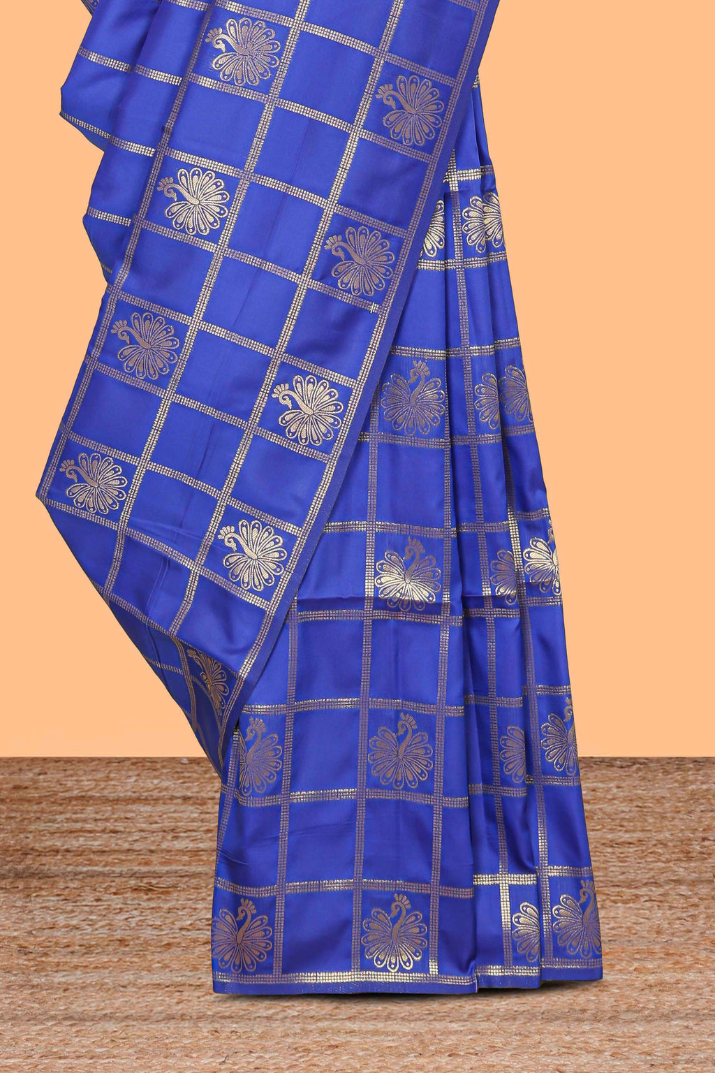 Borderless blue checked motifs design art silk saree with self zari pallu and motifs blouse